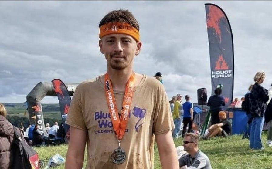 Tom Hill after finishing the Tough Mudder challenge